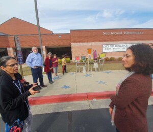 Ribbon cutting. "Unity" by Nathan Pierce. Located at Northwood Elementary. Sponsored by Northwood Foundation.